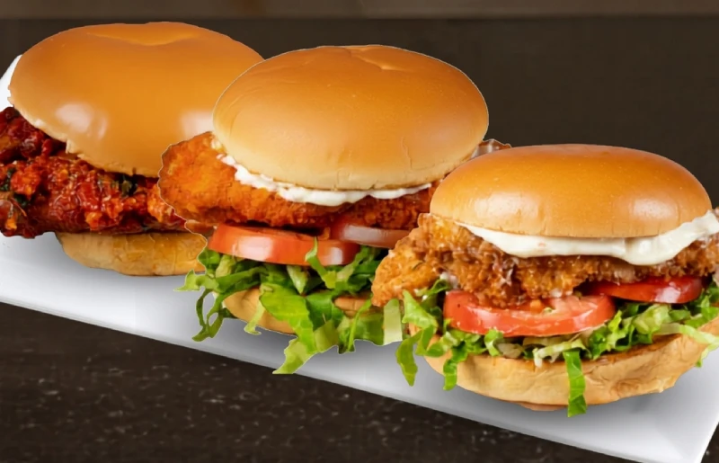 Crispy chicken sandwiches: Chicken Parmesan, Original Crispy and Louisiana Hot, lunch variety at Symposium Cafe.