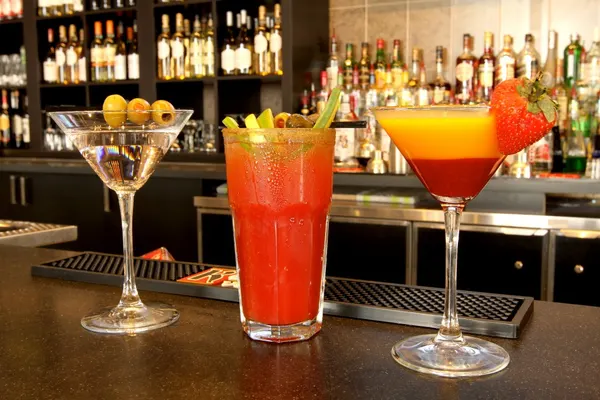 Classic martinis, Bloody Caesars and Mango Passion cocktails from the Symposium Cafe bar menu.