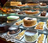 ontario restaurants dessert, beautiful cake display dessert options at symposium cafe