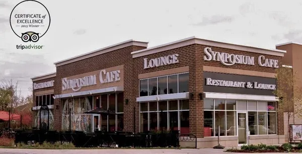 The outdoor facade and welcoming entrance of Symposium Cafe Restaurant Ajax, located at Rossland Road East