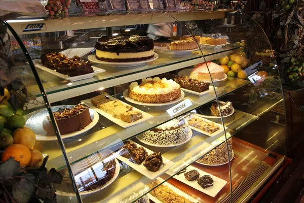 Bolton dessert restaurant showcasing gourmet layer cakes, creamy cheesecakes and indulgent sweets.