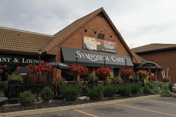 Brantford restaurant exterior with welcoming patio dining near Highway 403 and King George Road.