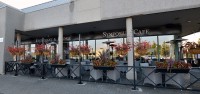 Symposium Cafe Restaurant Oakville Outdoor dining showing cozy patio area and the restaurant facade