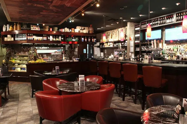 Bolton restaurant lounge with comfortable seating, warm lighting and a relaxed upscale-casual atmosphere.