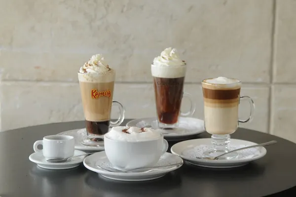 Symposium Cafe specialty coffee selection featuring espresso, lattes, cappuccinos and creamy creations.