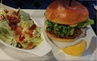 aurora restaurant burger night feature cheese mushroom and salad at symposium cafe