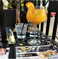 cocktails at the symposium cafe patio
