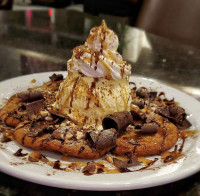 ontario restaurants dessert cookie colossal ice cream whipped cream chocolate at symposium cafe place near me