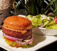cobourg restaurant vegetarian food menu, beyond meat plant based burger and salad at symposium cafe