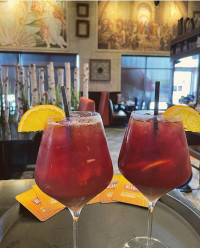 ontario restaurants serving sangria red wine cocktails happy hour at symposium pub