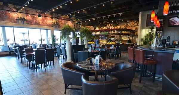 Oakville restaurant for groups with spacious seating, warm lighting and a relaxed setting for celebrations.