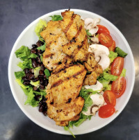 aurora dinner restaurant serving algarve chicken salad bowl at symposium cafe