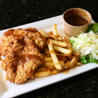 aurora restaurant crispy fried chicken dinner and fries at symposium cafe