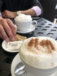 markham cafe serving cappuccino coffee on patio at symposium restaurant