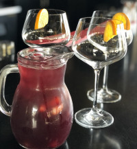 whitby restaurant cocktails, a pitcher of red wine sangria at symposium cafe