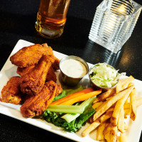 aurora restaurant; chicken wing appetizer with fries and coleslaw at symposium cafe