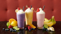 ontario restaurants serving beautiful looking fruit_milkshakes with garnishes at symposium cafe for drinks near me