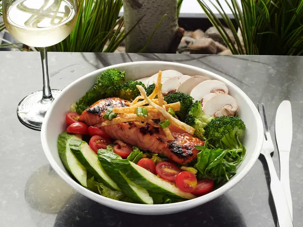 Ontario lunch favourite with teriyaki salmon salad, crisp vegetables and savoury dressing.