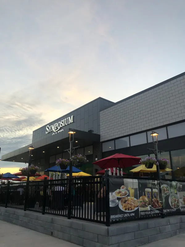 Welcoming North Oshawa restaurant exterior with a comfortable seasonal patio at RioCan Windfields.