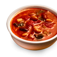 A bowl of our homemade Tuscan Bean Veggie Soup, loaded with fresh vegetables and hearty beans at Symposium Cafe Ajax nea