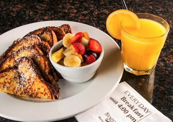 All-day breakfast in Thornhill with thick golden French toast, fresh fruit and chilled orange juice.