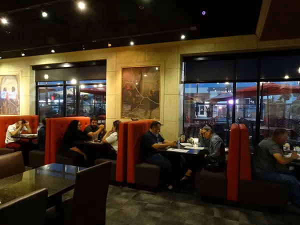Bolton family restaurant interior with comfortable booth seating, distinctive décor and a welcoming dining room.