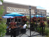 symposium cafe patio outdoor dining seating near me