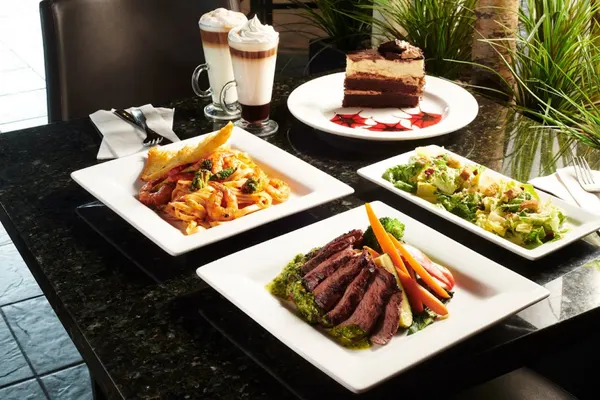 Steak pasta salad cake and specialty coffee dinner at Symposium Cafe Oakville
