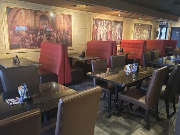 Thornhill family restaurant dining room with cozy booths and signature Renaissance-style decor