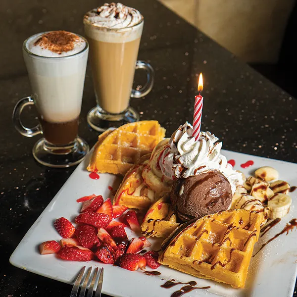 Thornhill dessert cafe birthday celebration serving gourmet Belgian waffles with ice cream strawberries and specialty co