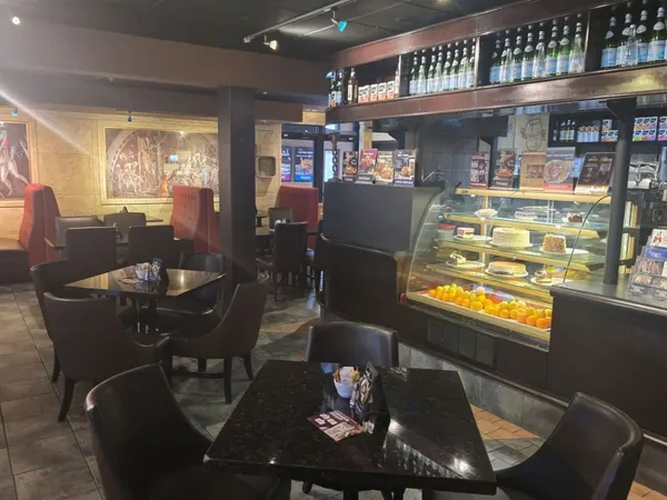 Thornhill cafe with a large variety of cakes and other specialty desserts with cozy seating at Symposium Restaurant