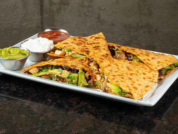 delicious lunch and dinner appetizer grilled chicken quesadilla in Waterloo Ontario near Erb St West