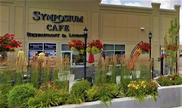 Aurora patio restaurant with comfortable seasonal outdoor dining on Hollandview Trail.