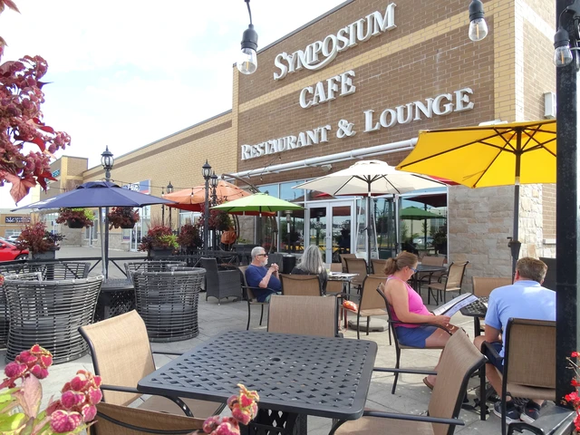Ancaster Restaurants Exterior & Patio dining for Symposium Cafe Restaurant Ancaster a Top Family-Friendly Restaurant in Ancaster, Ontario, and considered one of the Best All Around Restaurants in the Hamilton region serving Gourmet Comfort Food and drinks in a cozy, stylish patio