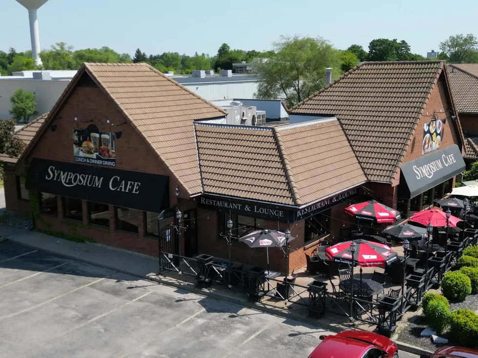 Symposium Cafe Restaurant Brantford exterior and cozy patio leading to our photo gallery with breakfast, desserts, drinks, dining room, patio, and food photos