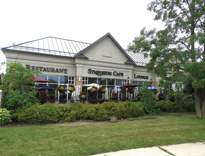 Symposium Cafe Restaurant Markham family restaurant exterior facade and outdoor patio seating located on Kennedy Road & Major MacKenize Drive East across from Angus Glen Golf Course.