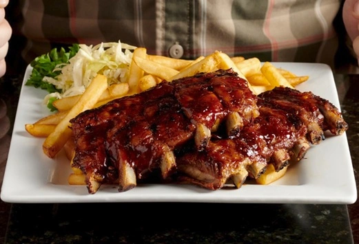 BBQ Ribs Dinner with fries and coleslaw at Symposium Markham Restaurant