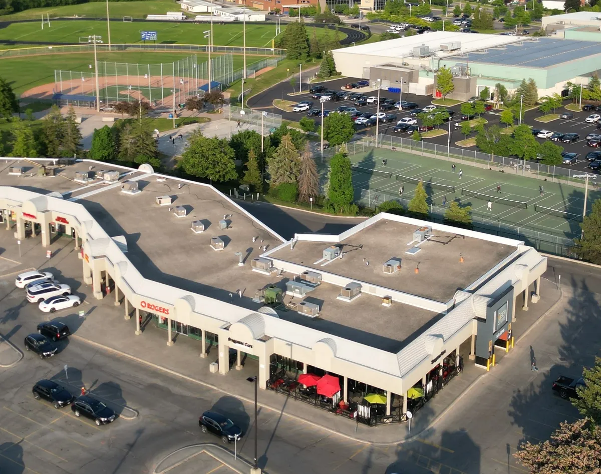 Aerial view of Symposium Cafe Restaurant Oakville, a family restaurant in the Sobeys plaza, beside the beer store, and next to Glen Abbey Community Centre