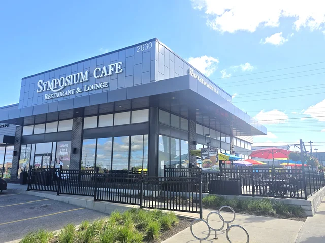  Oshawa Restaurants Interior and Cozy Dining Room of SYMPOSIUM CAFE RESTAURANT OSHAWA, the Top Family-Friendly Restaurant in Oshawa, Ontario, and serving Gourmet Comfort Food and drinks in a cozy, stylish patio outdoor dining area.