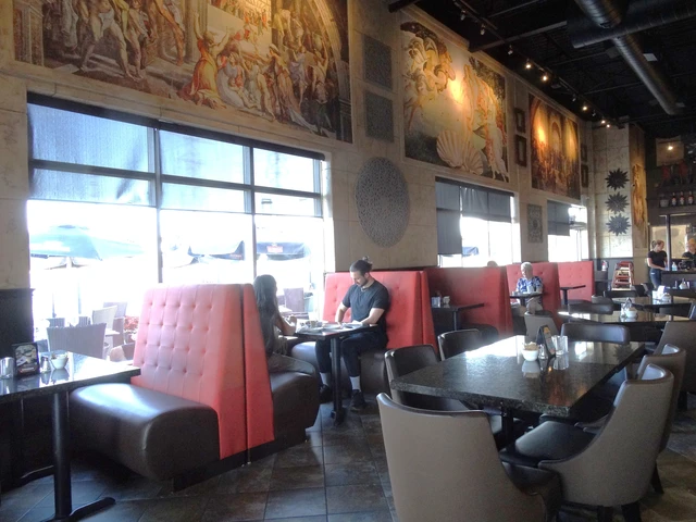 Waterloo Restaurants Interior Cozy Dining Room at Symposium Cafe Restaurant Waterloo A Top Family-Friendly Restaurant in Waterloo, Ontario, and serving Gourmet Comfort Food and drinks in a cozy, stylish place