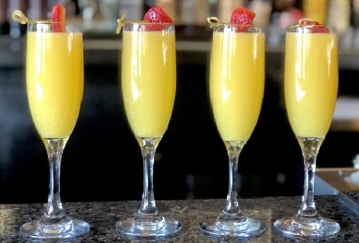 Breakfast Brunch Cocktails at Symposium Cafe Restaurant Woodbridge, a family restaurant serving up gourmet cocktails with a full bar.