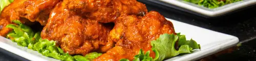 1/2 Off Wings, $7 Martinis & Mules Cocktails